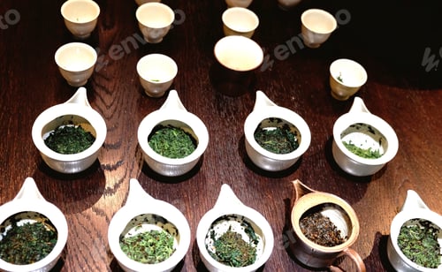Preview: Rows of tea kettles & cups for tea tasting