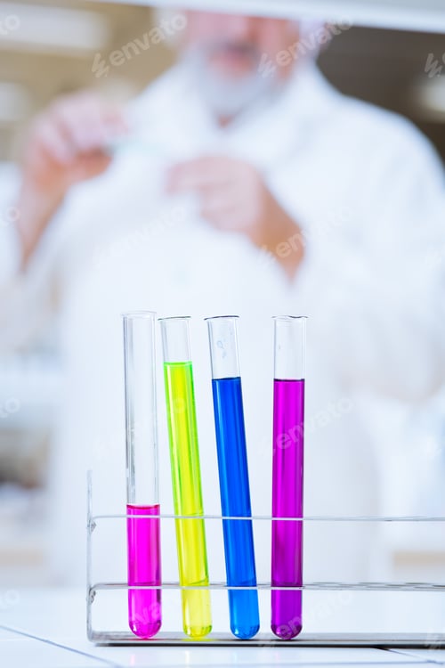 Preview: senior male researcher carrying out scientific research in a lab