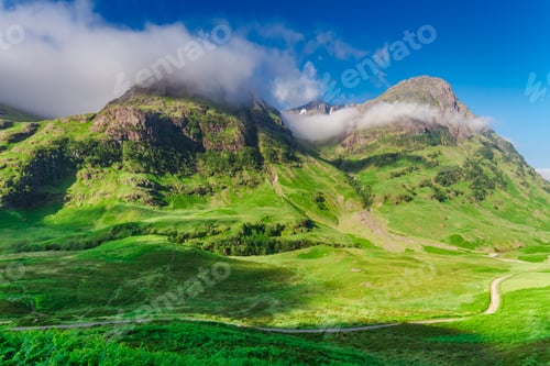 Preview: Sunrise at mountains of green Glencoe, Scotland
