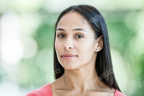 Preview: Mixed race caucasian woman in a business center lobby.