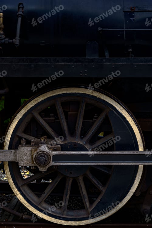 Preview: Closeup shot of a vintage steam engine wheel