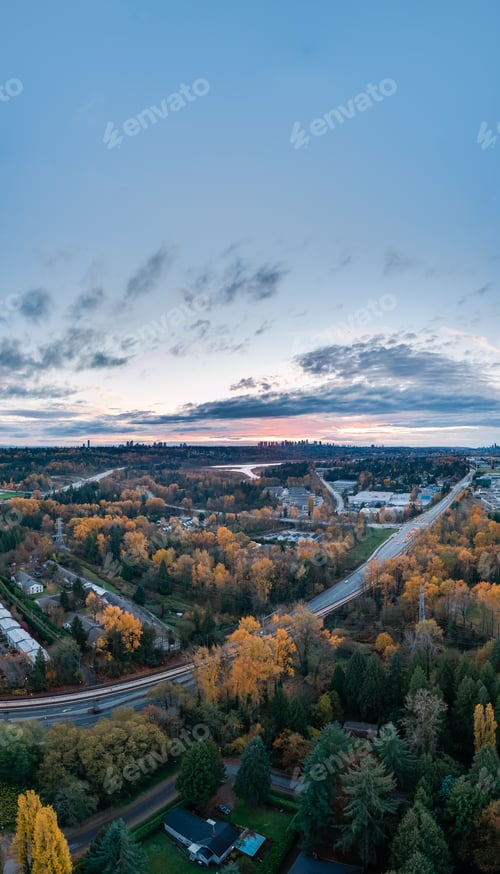 Preview: Aerial Autumn Cityscape Over Burnaby With Highway, River, and Sunset Sky