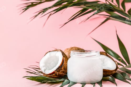 Preview: Coconut oil and coconuts on a bright pastel background.