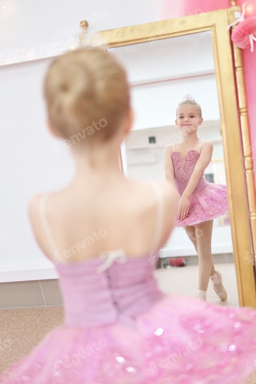 Preview: Young Ballerina in Pink Tutu Reflecting in Mirror