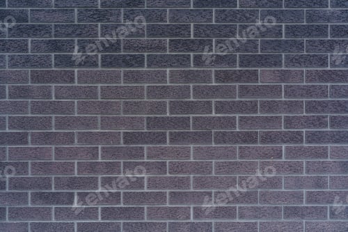 Preview: Close-up of a textured grey brick wall