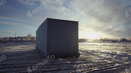 Preview: The loading container is on the snow. CLIP. View from different sides of one container standing on