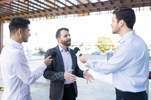 Preview: Businessman Giving Speech At An Outdoors Event
