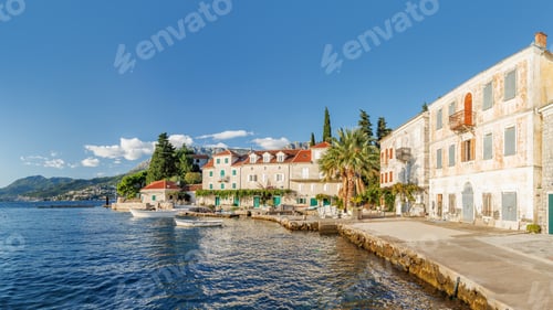 Preview: Cozy coastal town in Montenegro with traditional houses and sea view
