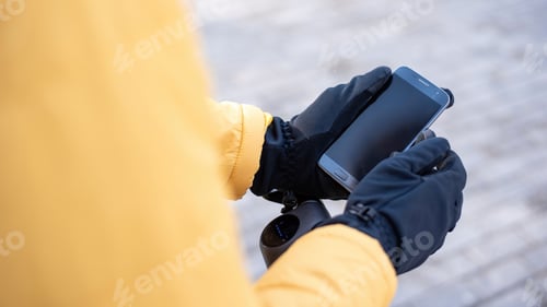 Preview: Food delivery man using smartphone