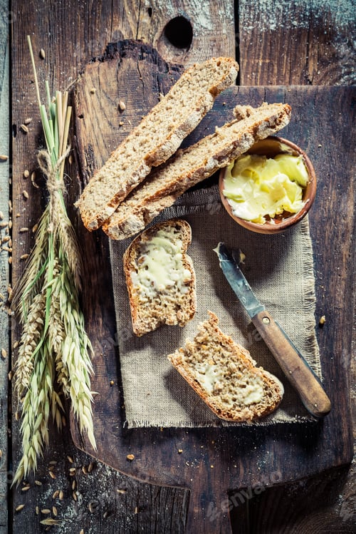 Preview: Closeup of bread with butter for breakfast
