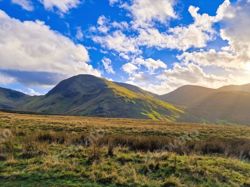 Preview: Scenic view of an autumnal mountain landscape on a sunny day