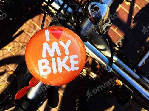 Preview: A brightly coloured bell on a bicycle saying I Love My Bike