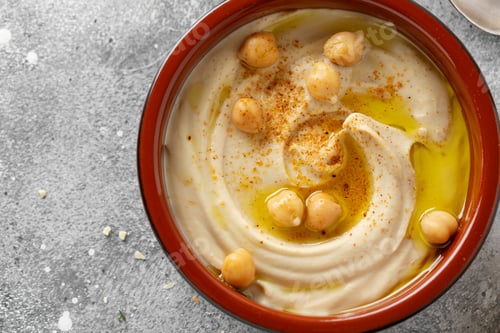 Preview: Hummus served in bowl on table