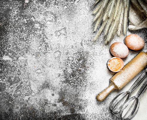 Preview: Baking background. Ingredients and tools for dough preparation.