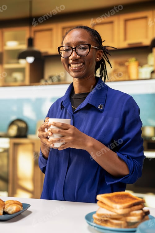 Preview: Portrait of smiling woman preparing delicious morning pastry in cozy home