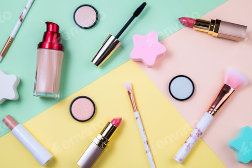 Preview: Makeup products and decorative cosmetics on color background flat lay