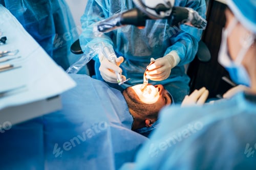 Preview: Team dental surgeons working in dental clinic.