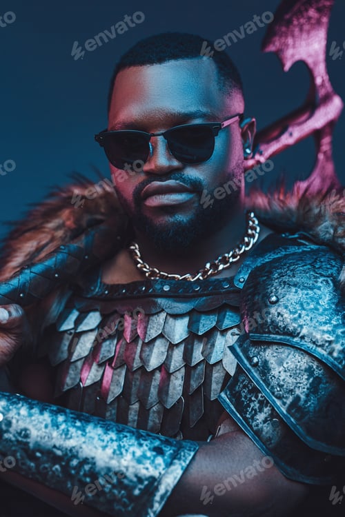 Preview: African man with sunglasses holding axe on his shoulder