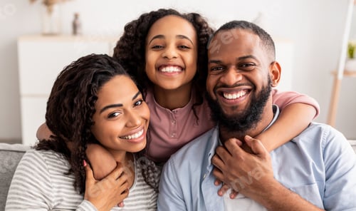 Preview: Happy Family Smiling Together Indoors at Home