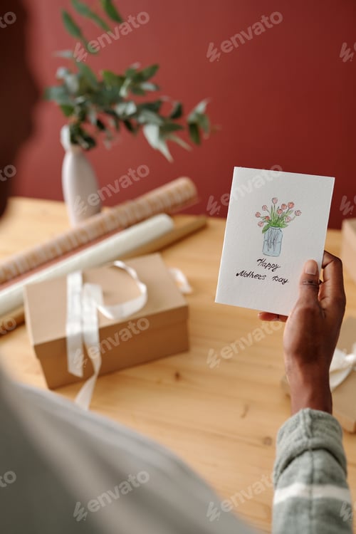 Preview: Handmade greeting card in female hand