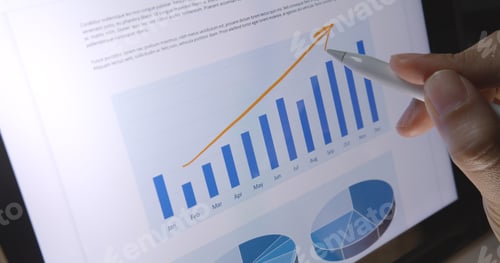 Preview: Close-up hand use pen write check growth data number