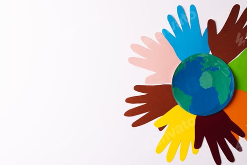 Preview: Paper cut out of multi coloured hands and globe with copy space on white background