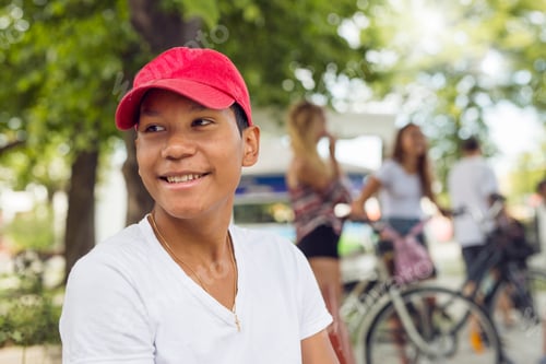 Preview: Portrait of teenage boy (14-15) in park