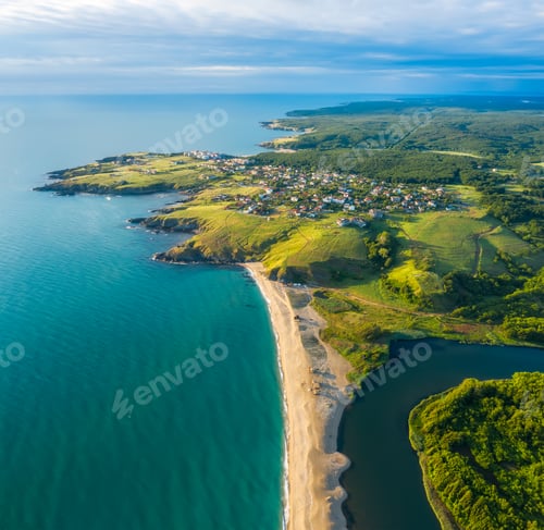 Preview: Picturesque rocky coastline with sandy beaches and green forests