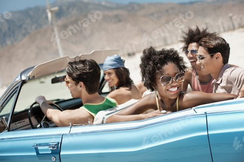Preview: A group of friends in a pale blue convertible on the open road