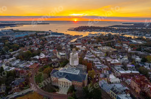 Preview: Aerial shot of Annapolis harbor, Chesapeake Bay and Maryland Capitol building at sunset.