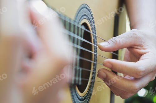 Preview: playing acoustic guitar