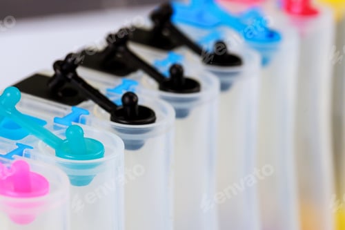 Preview: Close up select focus color CMYK ink tank on inkjet printer