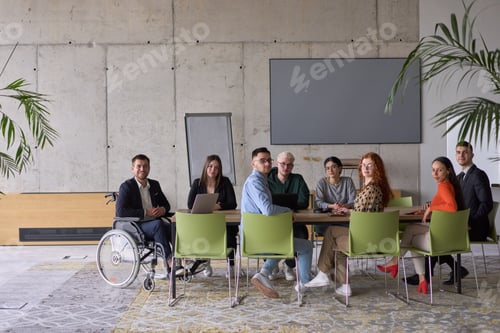Preview: A diverse group of business professionals sitting in an office meeting with their director, who is