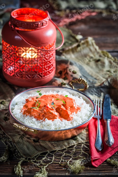 Preview: Tasty tikka masala with rice and tomato sauce