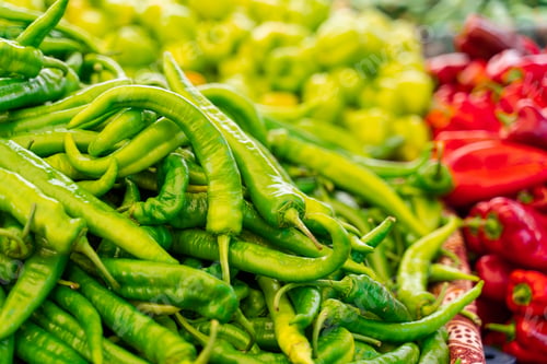 Preview: Colorful assortment of chili and bell peppers at vegetable market