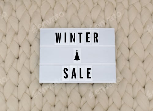 Winter Sale Lightbox on Cozy Woven Wool Background