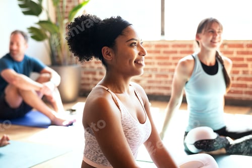 Preview: Sportive people in a yoga class