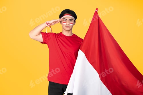 Preview: Enthusiastic Young Man Saluting with a National Flag