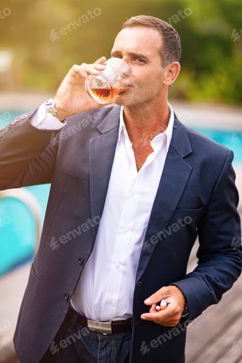 Preview: Drinking too much. Businessman suffering from alcoholism