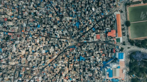 Preview: Aerial view of the Ason Street and buildings around in bright sunlight in Kathmandu, Nepal