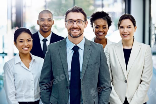 Preview: Portrait of a group of businesspeople standing together in their office