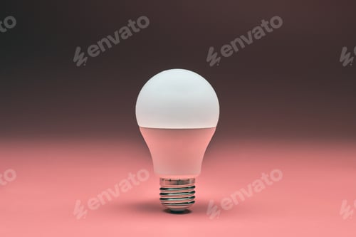 Preview: Light bulb, copy space. Energy saving minimal idea concept.Pink background.
