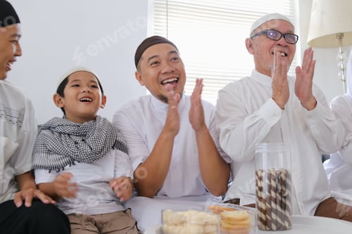 Preview: Muslim Family Spending Time Together During Celebration of Eid Al Fitr on The Living Room