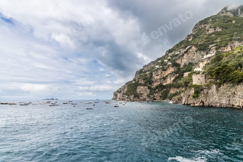 Preview: Scenic view of Positano cliff and sea with boats along Amalfi Coast in Campania, Italy