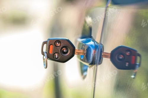 Preview: Close up of car door with key sticking out of the lock. Concept of process opening or closing