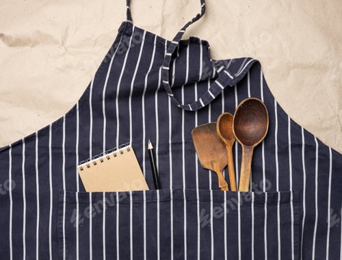 Preview: Blue chef's apron, inside a pocket of wooden spoons
