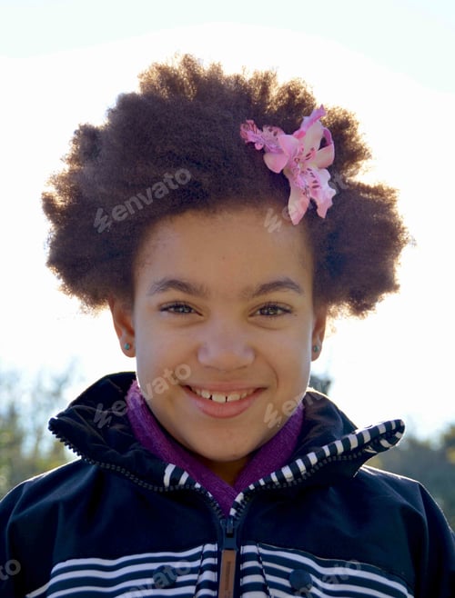Preview: Mixed race girl with natural Afro