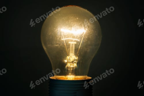 Preview: Illuminated Light Bulb on a Dark Background