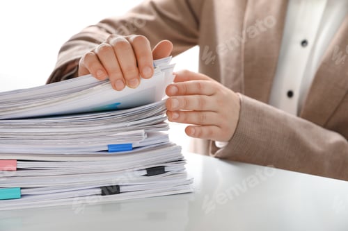 Preview: Woman working with documents in office, closeup