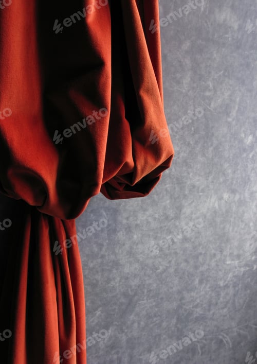 Preview: Abstract Orange Fabric on Textured Grey Background